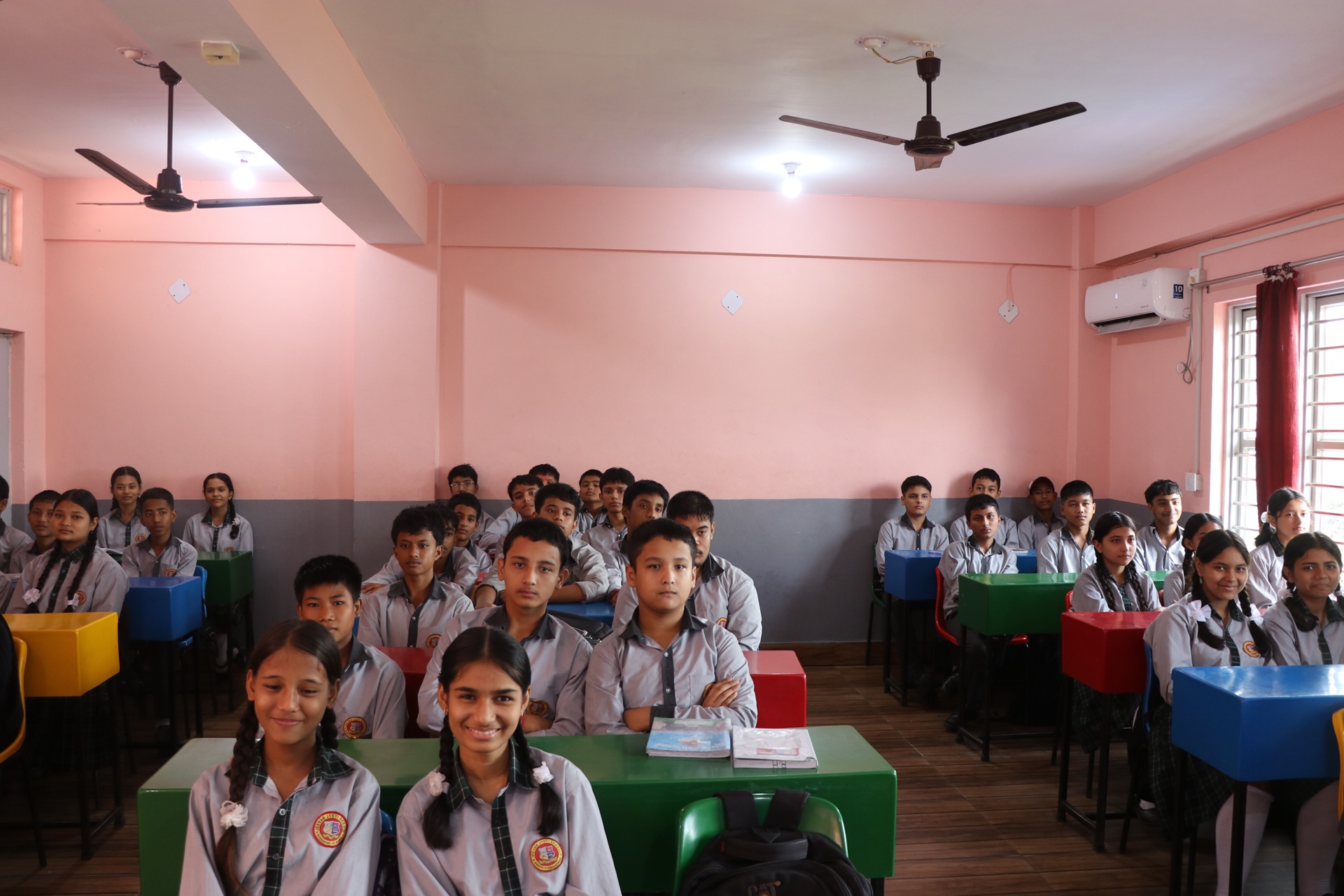 Smart classroom with multimedia board and students