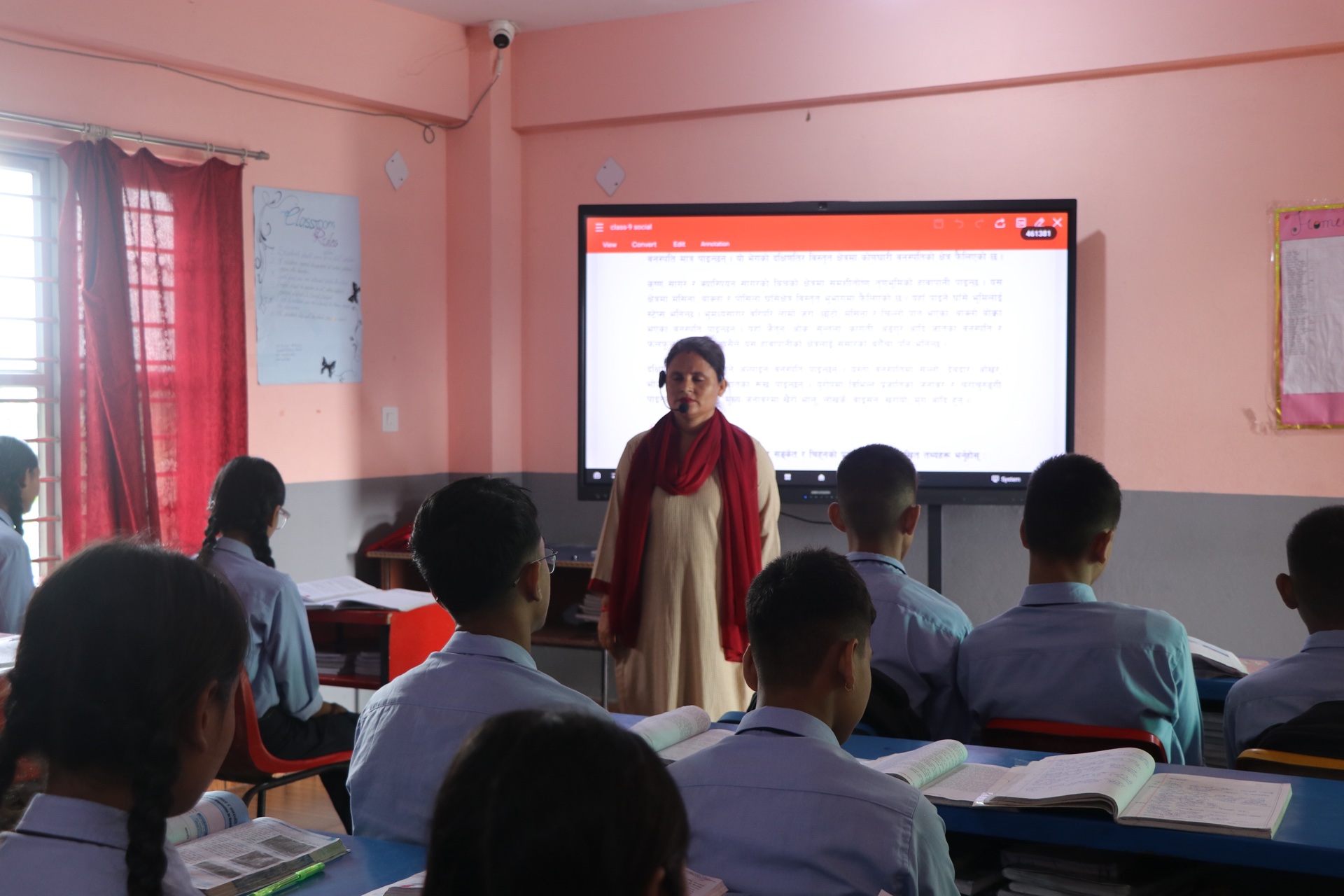Students writing notes during interactive lecture