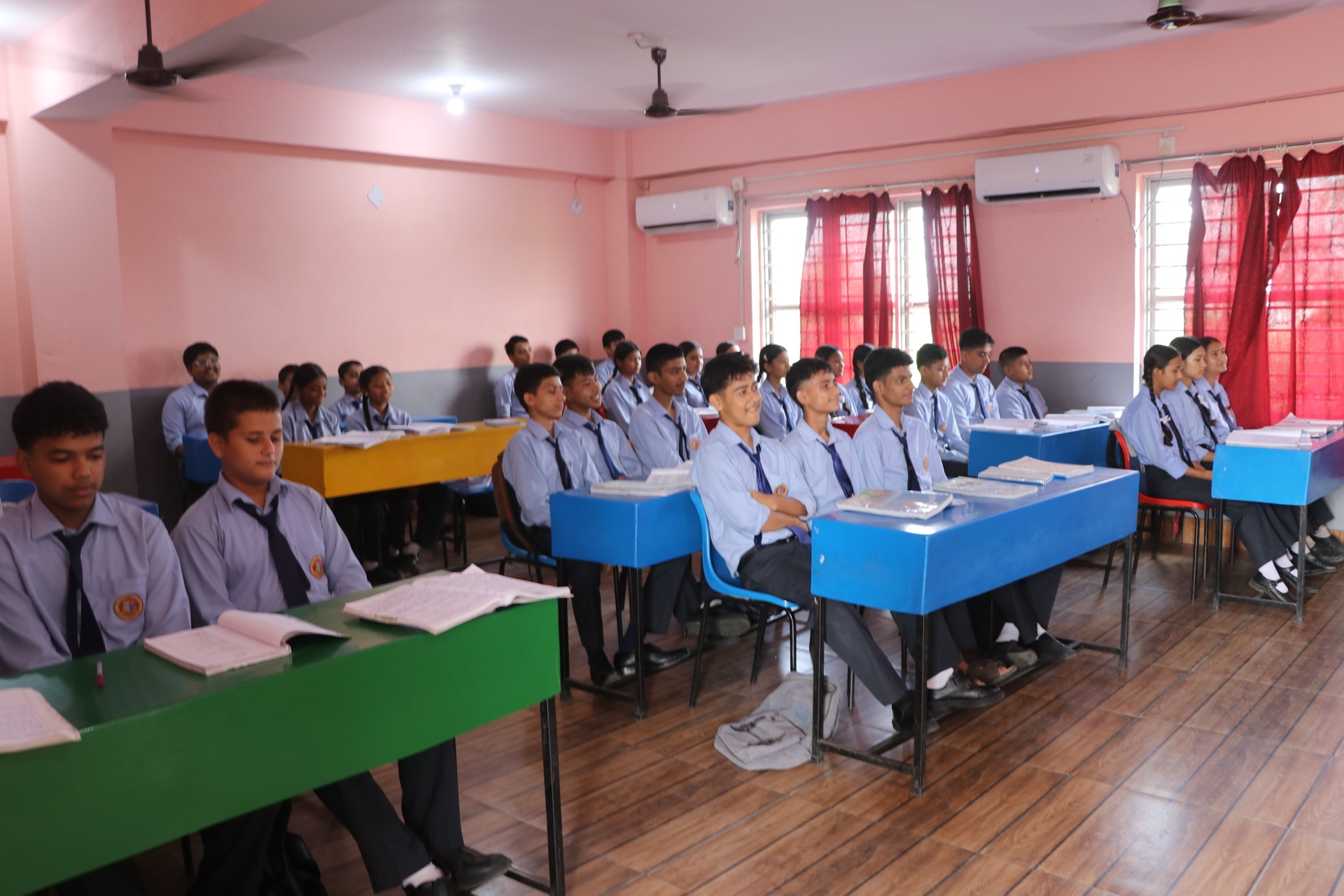 Teacher demonstrating lesson material on smart panel