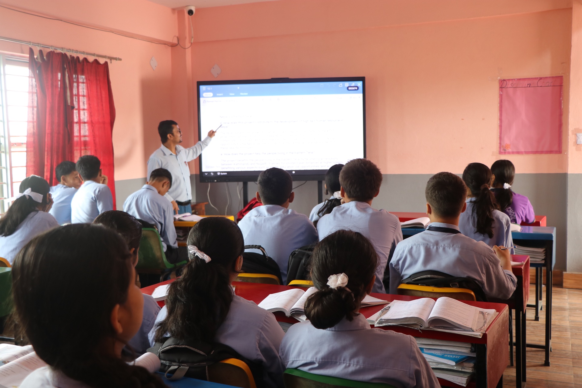 Students reviewing lessons and textbooks