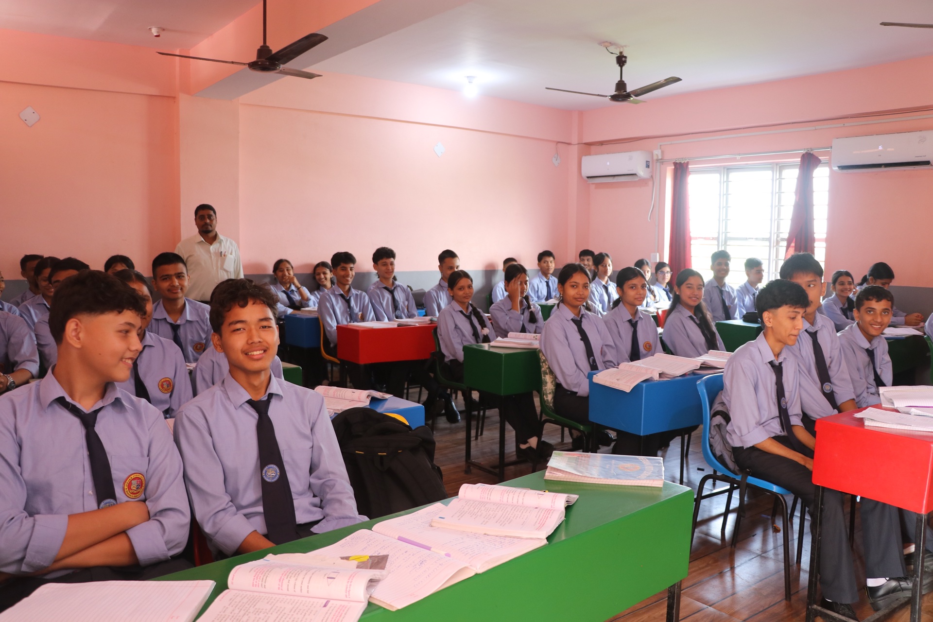 Students participating actively in classroom lesson