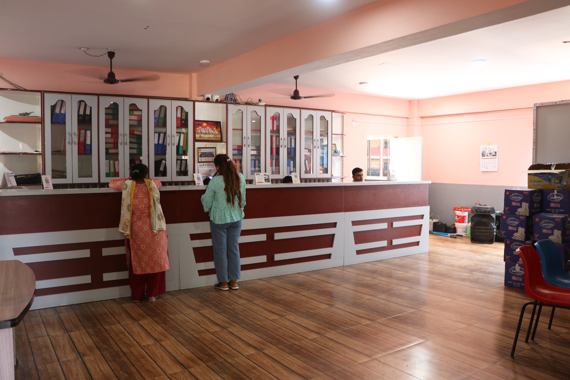 Front desk reception and inquiry counter at Jeevan Jyoti