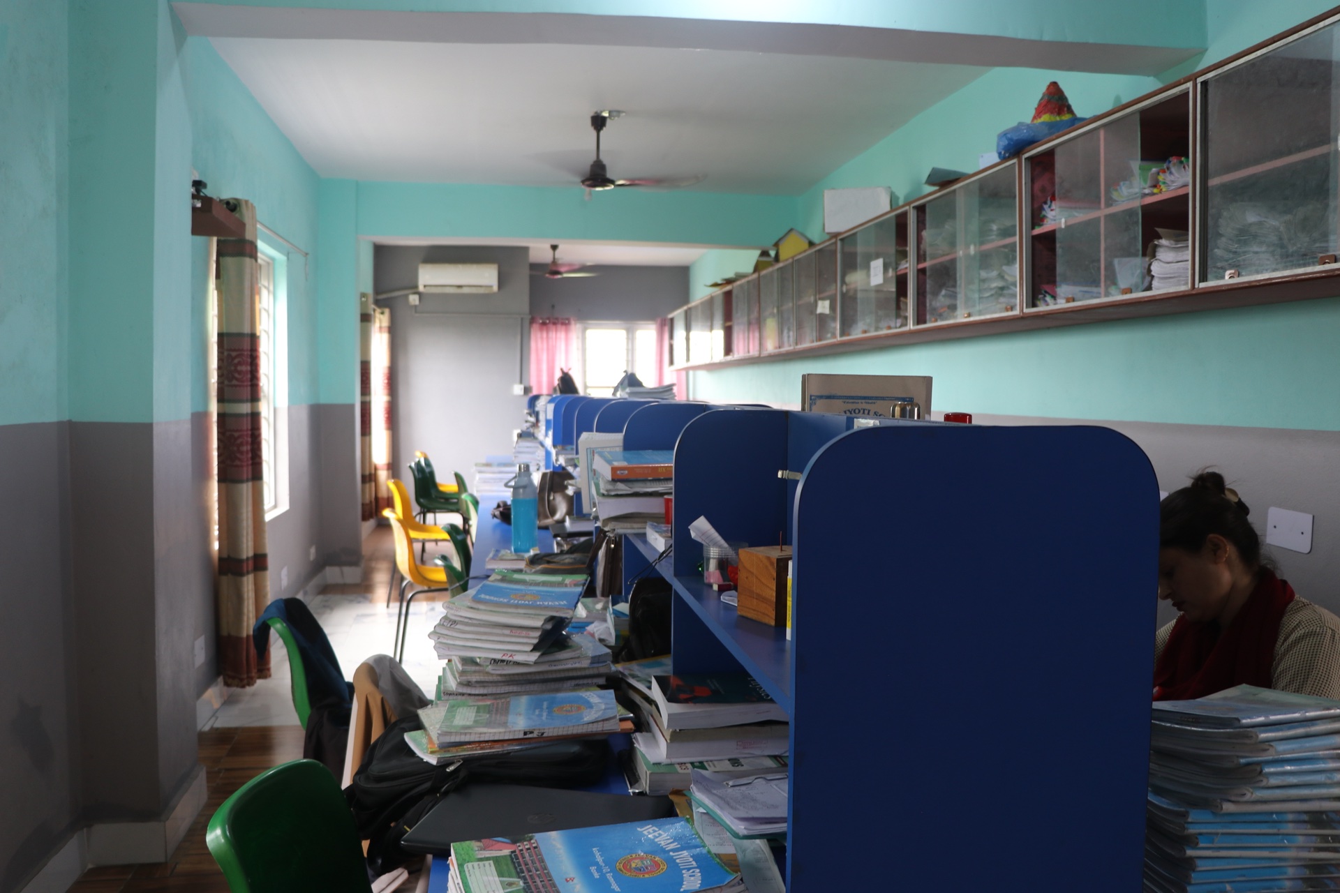 Faculty staff room with study cubicles and reference materials